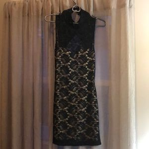Black lace cocktail dress with nude lining